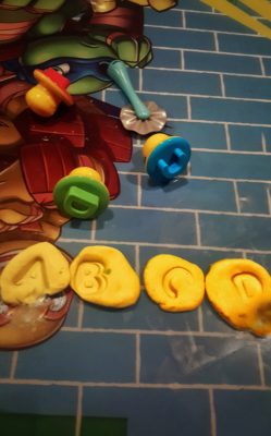 Playing with Play-Doh to learn the alphabet
