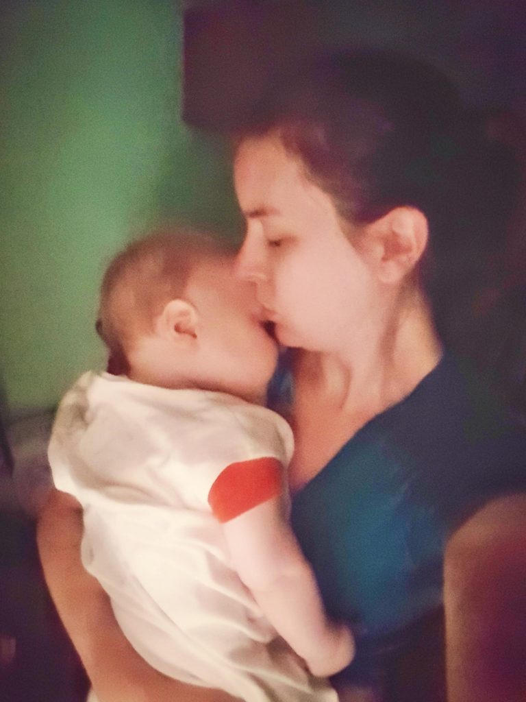 Giving baby extra snuggles before being apart!
