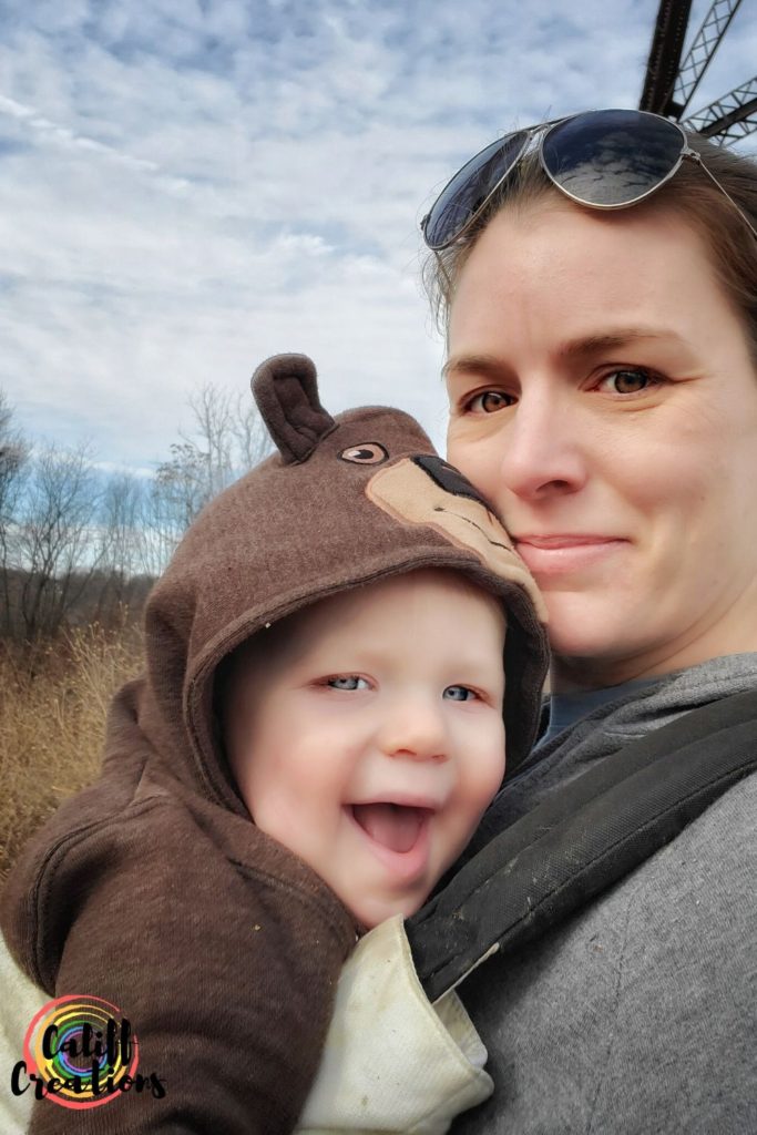 Carrying my son at Schunnemunk State Park on our first hike of the year toward our goals