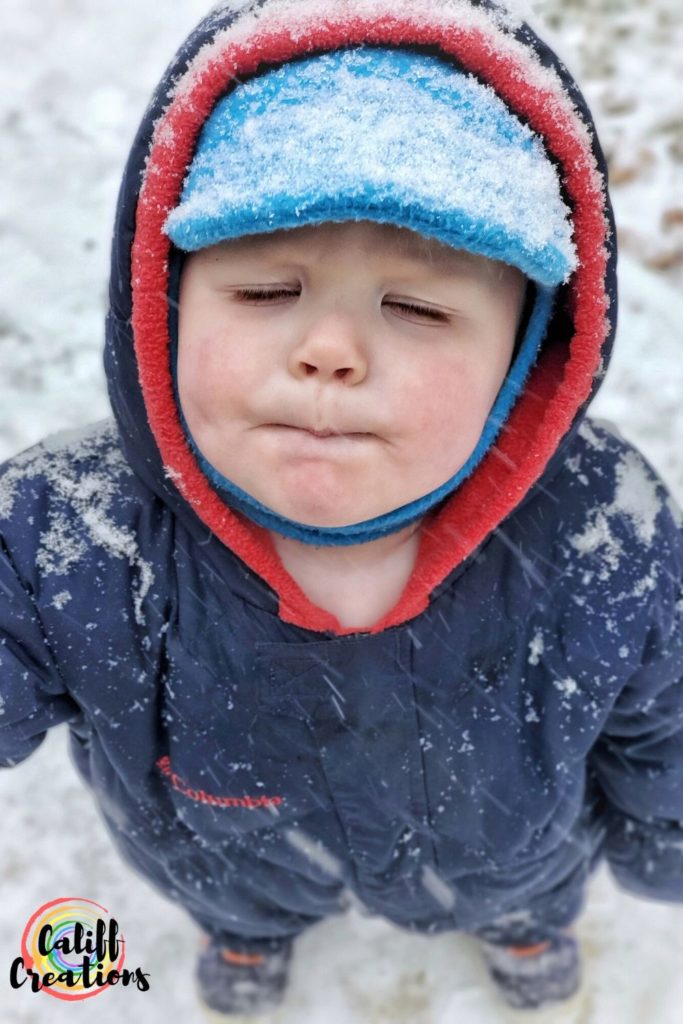 Toddler enjoying the snowfall in more outdoor hours toward our goals