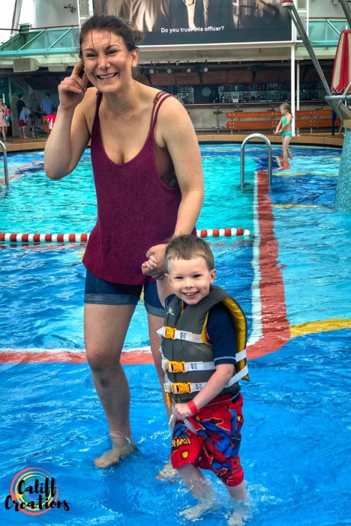 My sister and son at the cruise ship pool