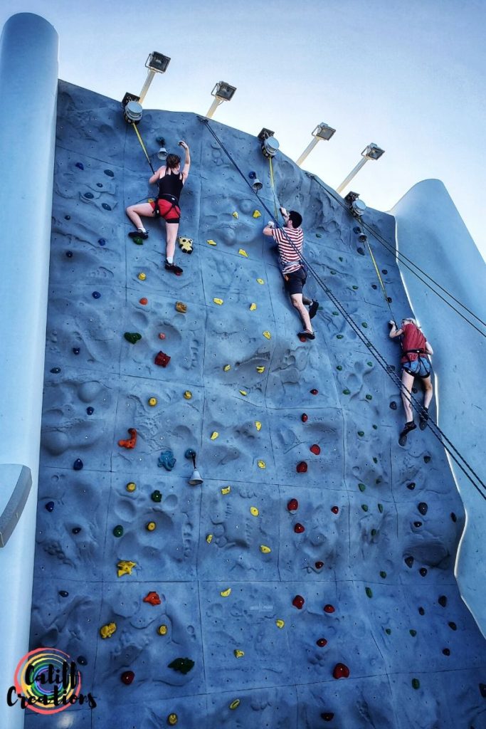Me, my brother-in-law and his girlfriend at the top of the rock climbing wall