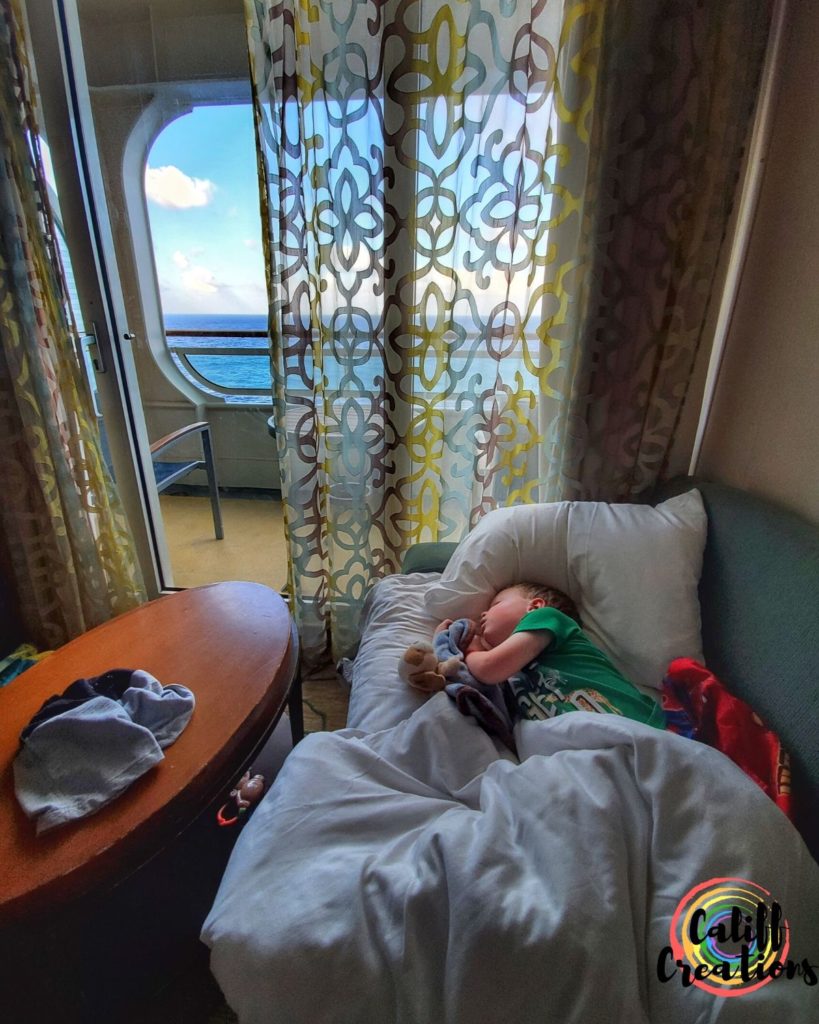 Our son sleeping on the cruise ship