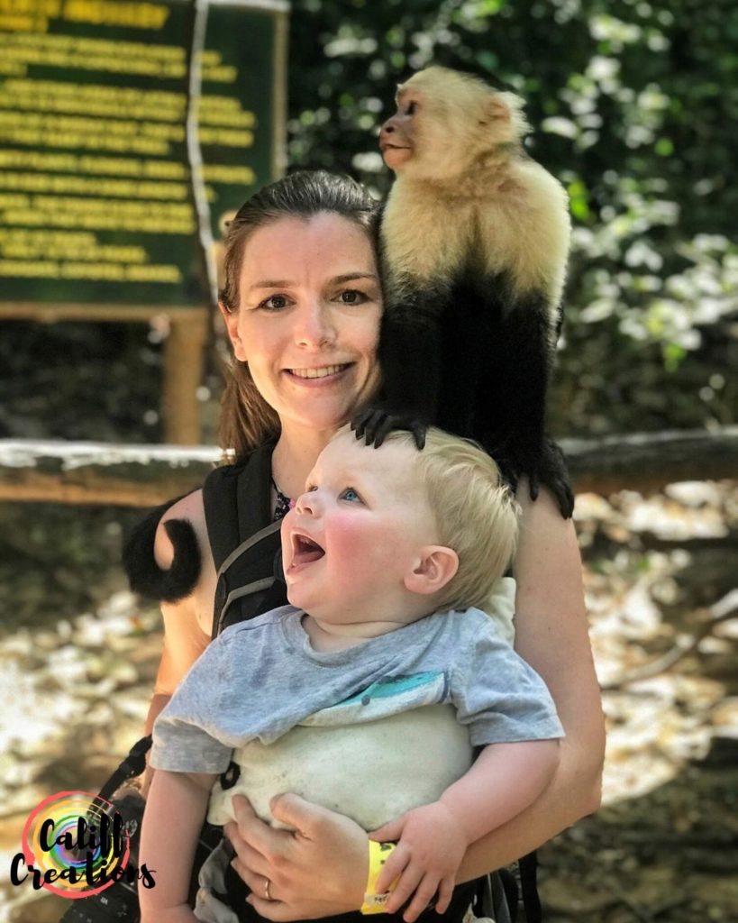 My 1 year old and I with a monkey during shore excursions to Gumbalimba Park