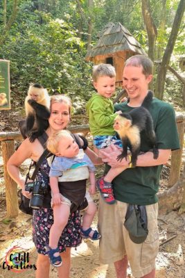 Family with a monkey during shore excursions to Gumbalimba Park