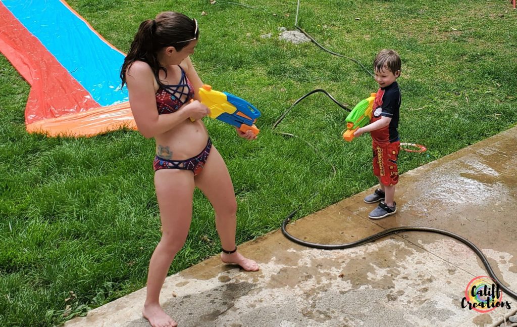 My son and I having a water fight