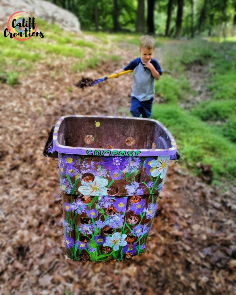 Filling the compost bin with dry leaves