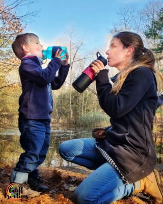 My son and I getting hydrated on the trail