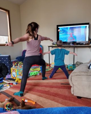 Practicing yoga with my son