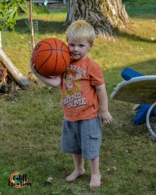 My youngest with a basketball