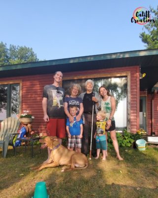 Family photo in front of the cabin